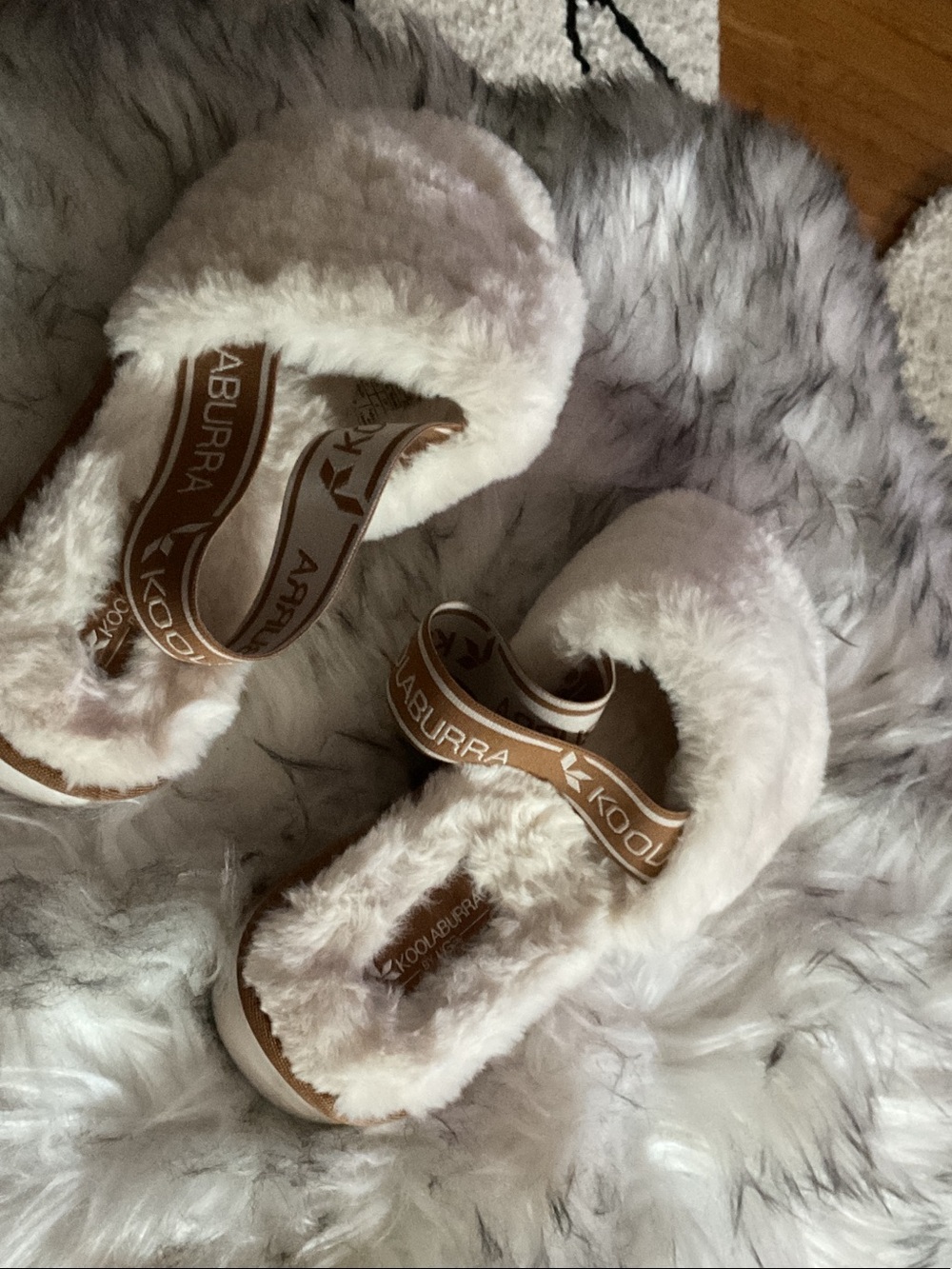 Koolaburra woman’s Cream Fuzzy Slide Slippers with Brown Branded Elastic Strap